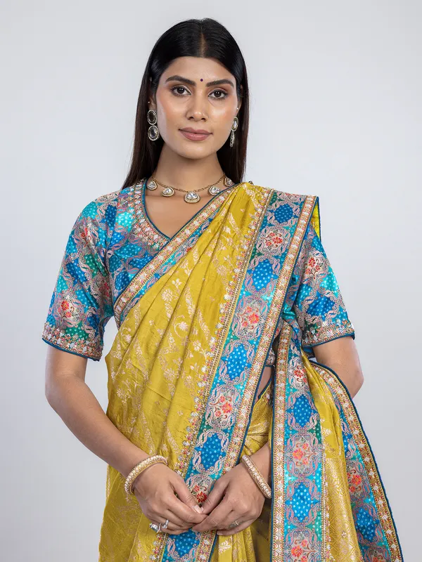 Yellow dola silk saree with contrast blue blouse