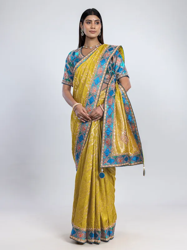 Yellow dola silk saree with contrast blue blouse