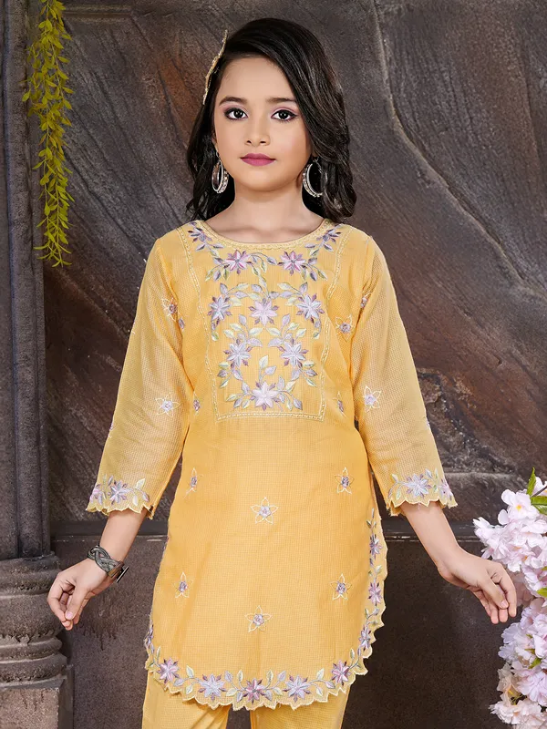 Yellow embroidered cotton silk salwar suit with pants