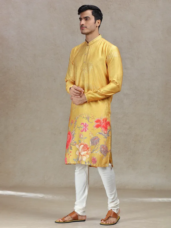 Yellow eye-catching printed kurta suit in tussar silk