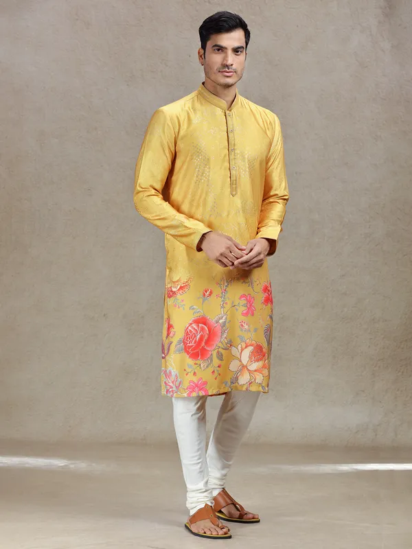 Yellow eye-catching printed kurta suit in tussar silk