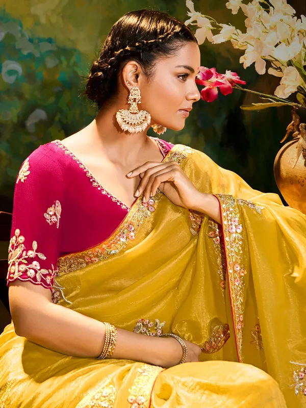 Yellow festive wear saree in tissue silk
