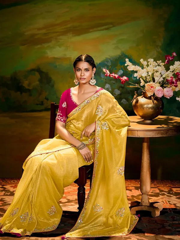 Yellow festive wear saree in tissue silk
