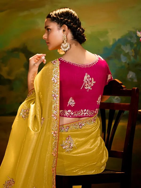 Yellow festive wear saree in tissue silk