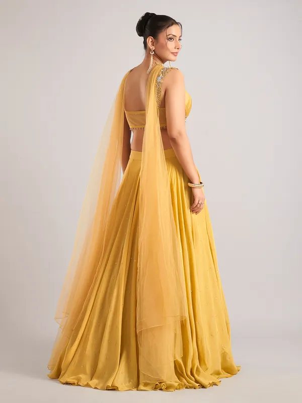 Yellow georgette lehenga choli with dupatta for wedding wear