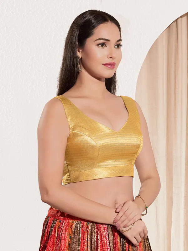 Yellow gold ready made blouse in rich silk