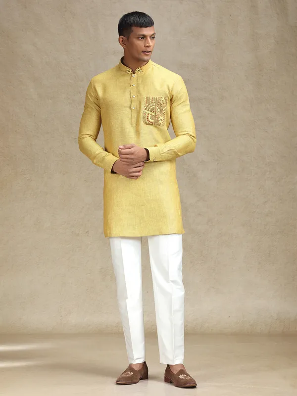 Yellow kurta pajama set in textured embroidery