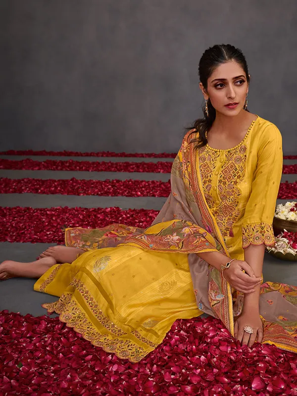 Yellow muslin silk salwar suit with cutwork