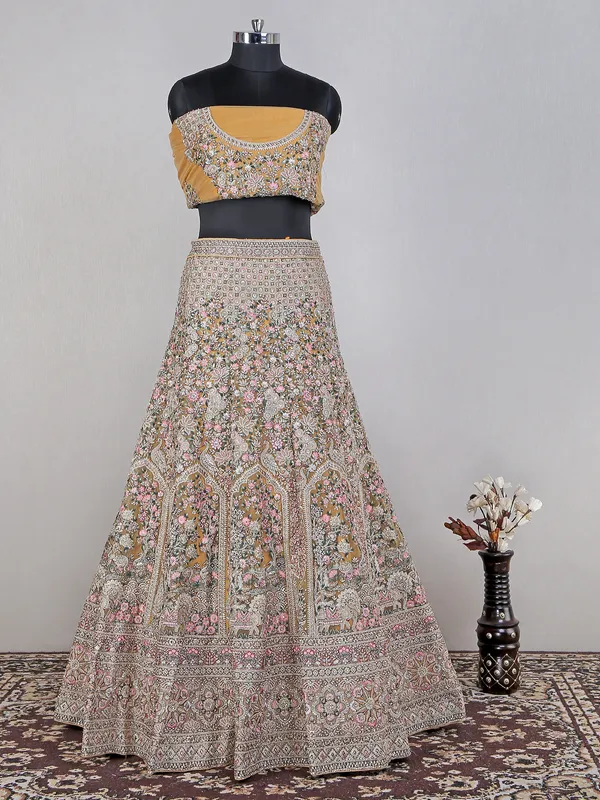 Yellow net lehenga choli for haldi wear