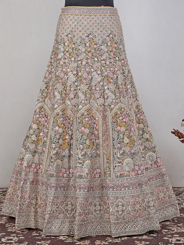 Yellow net lehenga choli for haldi wear