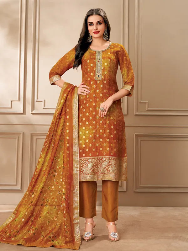 Yellow organza salwar suit with zari work