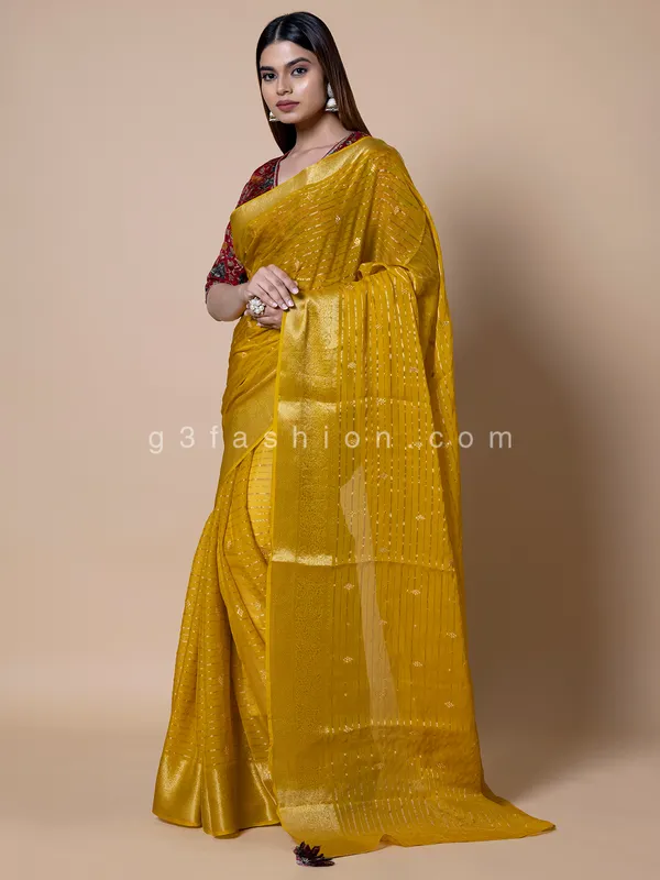 Yellow organza saree for festive