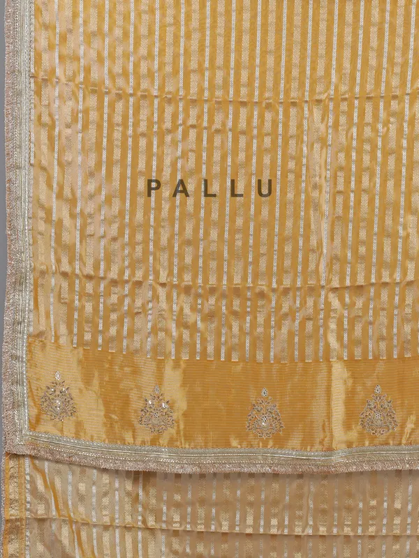 Yellow organza saree with mirror work