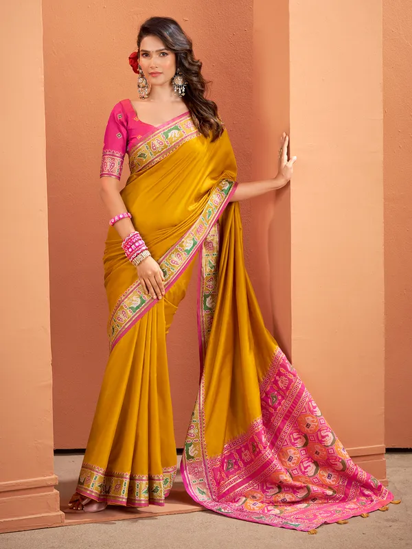 Yellow patola silk saree with cultural spark