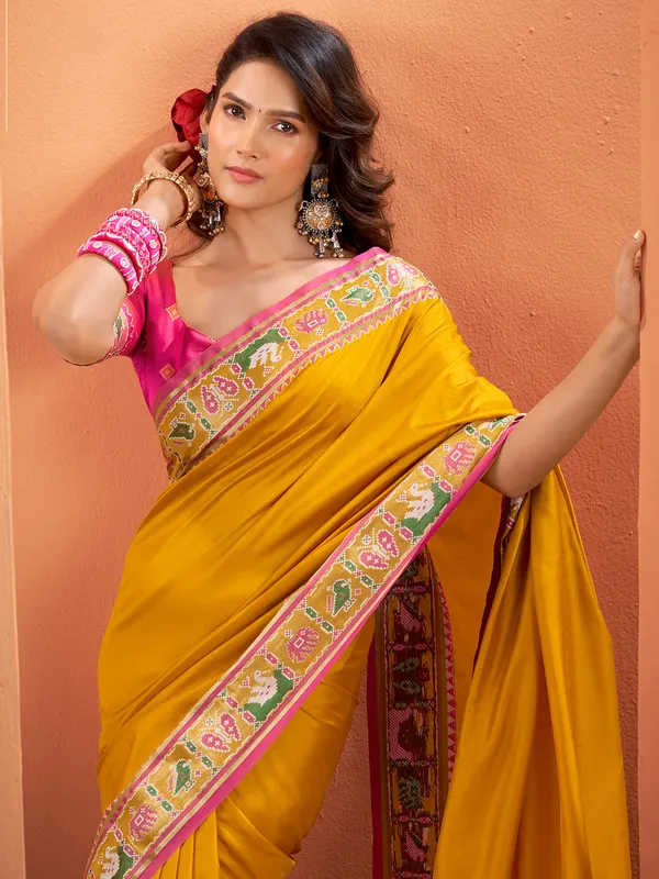 Yellow patola silk saree with cultural spark
