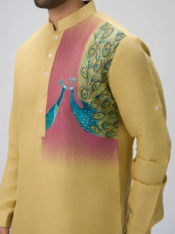 Yellow peacock motif linen kurta ensemble