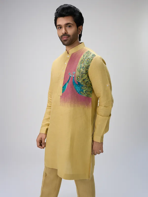 Yellow peacock motif linen kurta ensemble