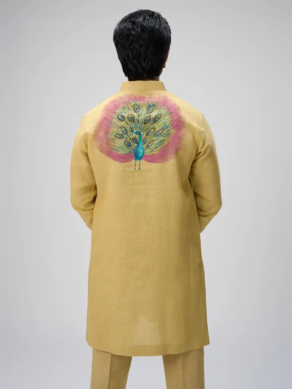 Yellow peacock motif linen kurta ensemble