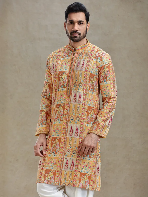 Yellow printed kurta salwar set in embroidery