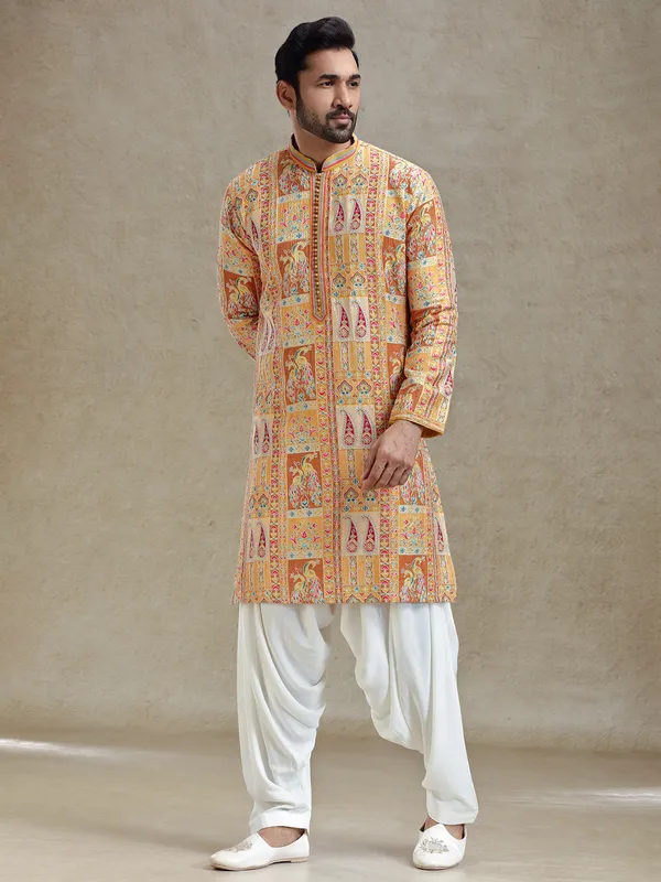 Yellow printed kurta salwar set in embroidery
