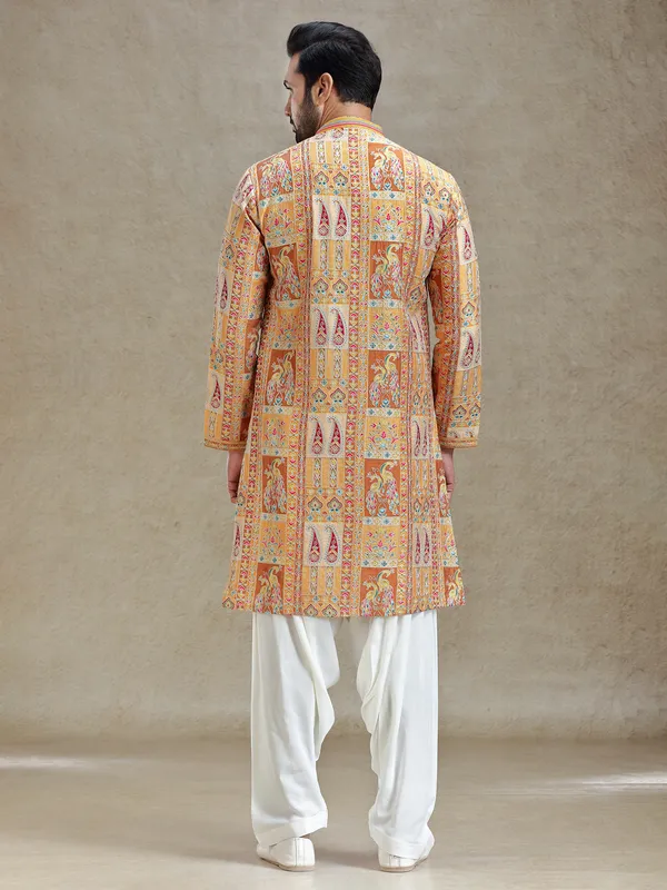 Yellow printed kurta salwar set in embroidery