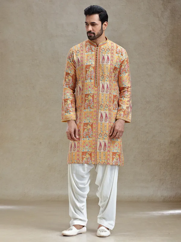 Yellow printed kurta salwar set in embroidery