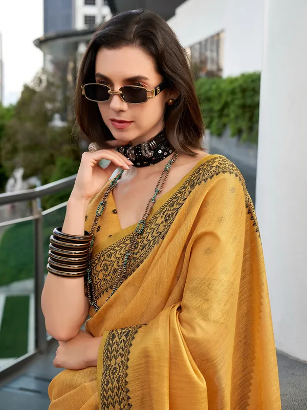 Yellow printed linen tissue silk saree