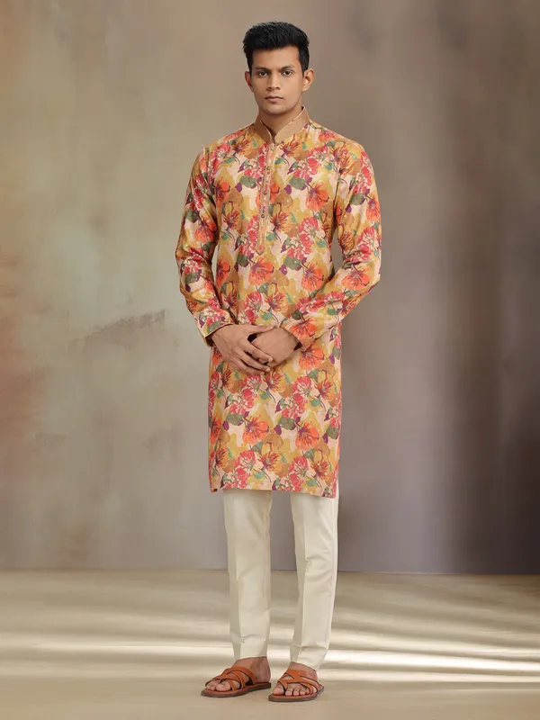 Yellow printed jaquard silk kurta pajama for festive wear