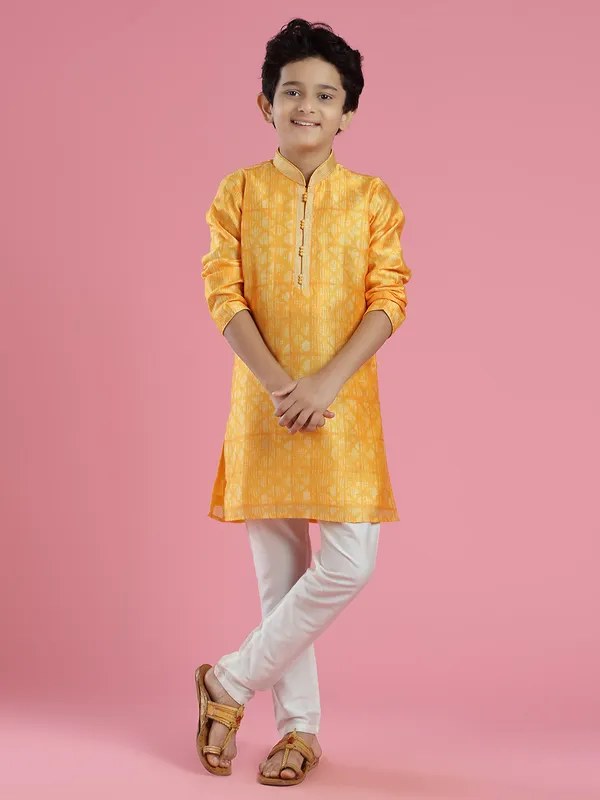 Yellow printed silk kurta suit for festivals