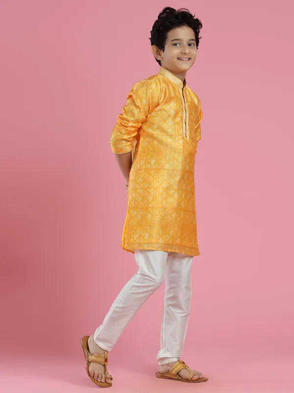 Yellow printed silk kurta suit for festivals