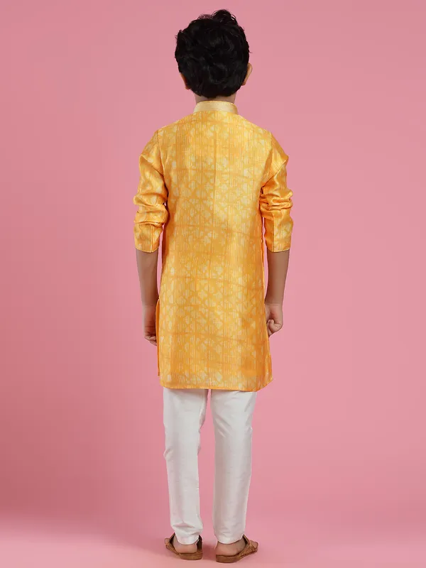 Yellow printed silk kurta suit for festivals