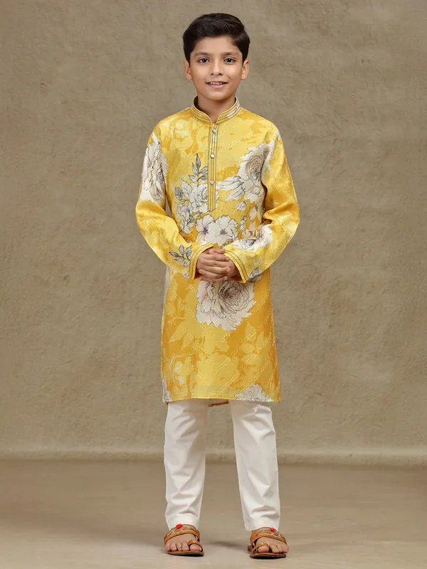 Yellow printed silk kurta suit for festive wear