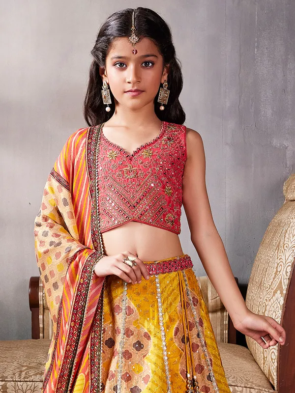 Yellow printed silk lehenga choli for reception