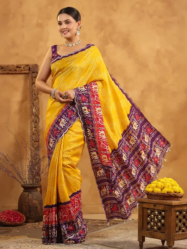 Yellow printed silk saree with sequins work