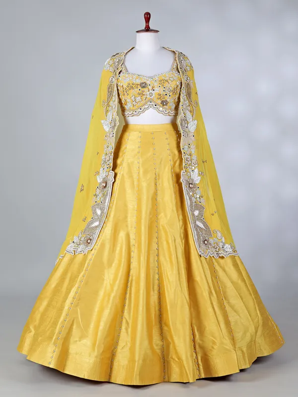 Yellow raw silk designer haldi lehenga choli with dupatta