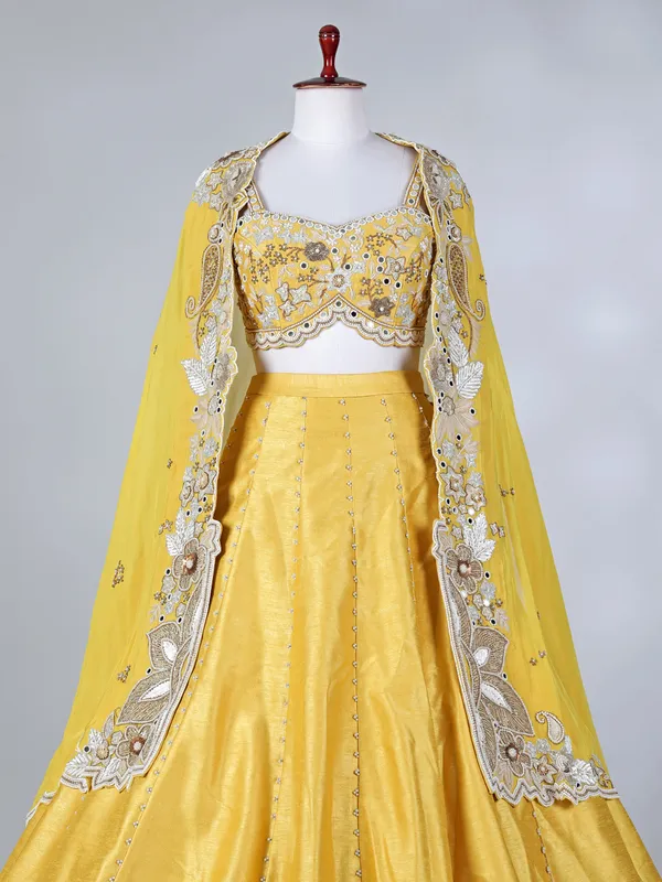 Yellow raw silk designer haldi lehenga choli with dupatta