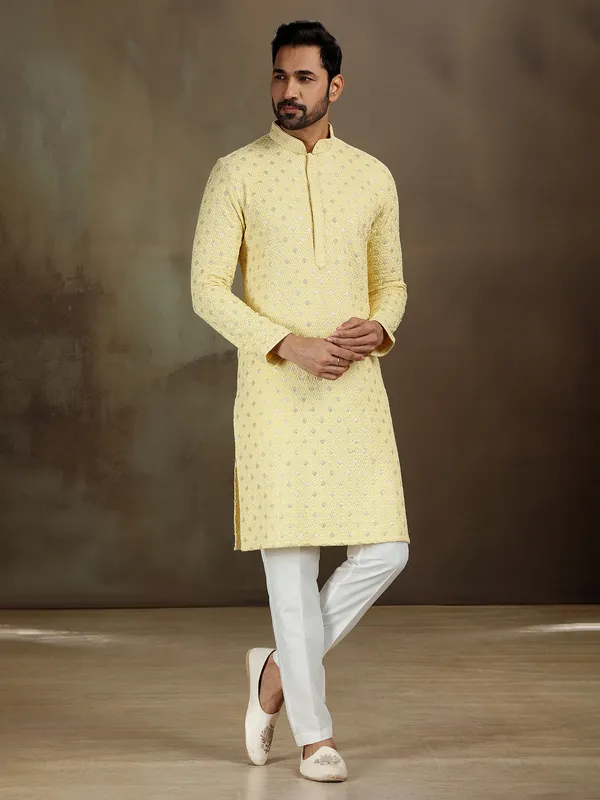 Yellow royan kurta set with subtle shine