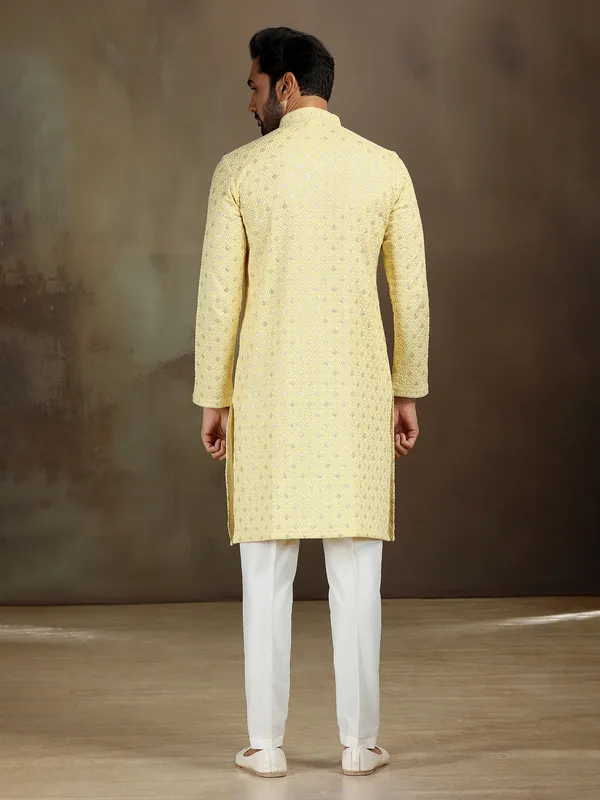 Yellow royan kurta set with subtle shine