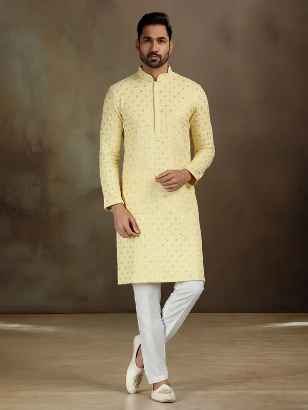 Yellow royan kurta set with subtle shine