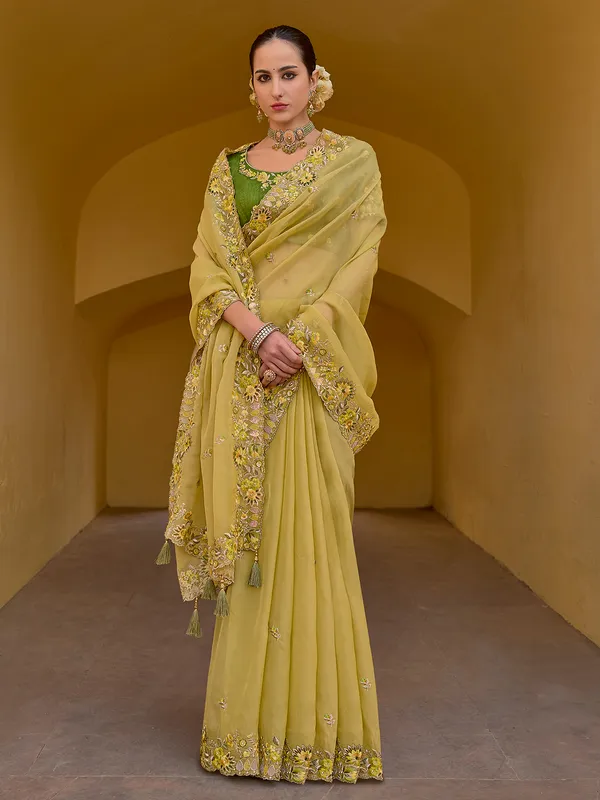 Yellow saree with embroidery border