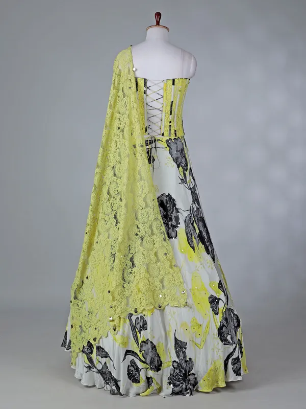 Yellow satin silk lehenga choli with floral print