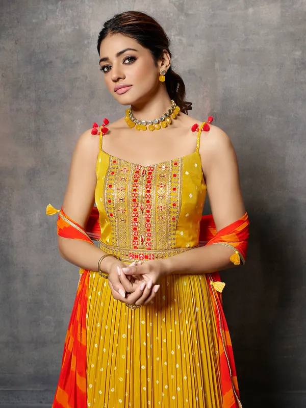 Yellow silk anarkali suit with leheriya dupatta