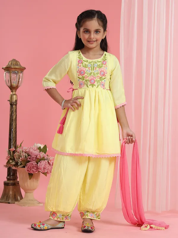 Yellow silk dhoti style salwar suit with dupatta