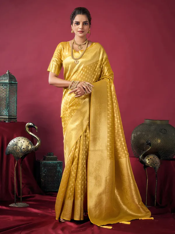 Yellow silk festive wear saree with zari work