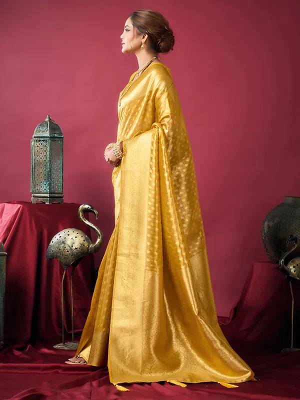 Yellow silk festive wear saree with zari work
