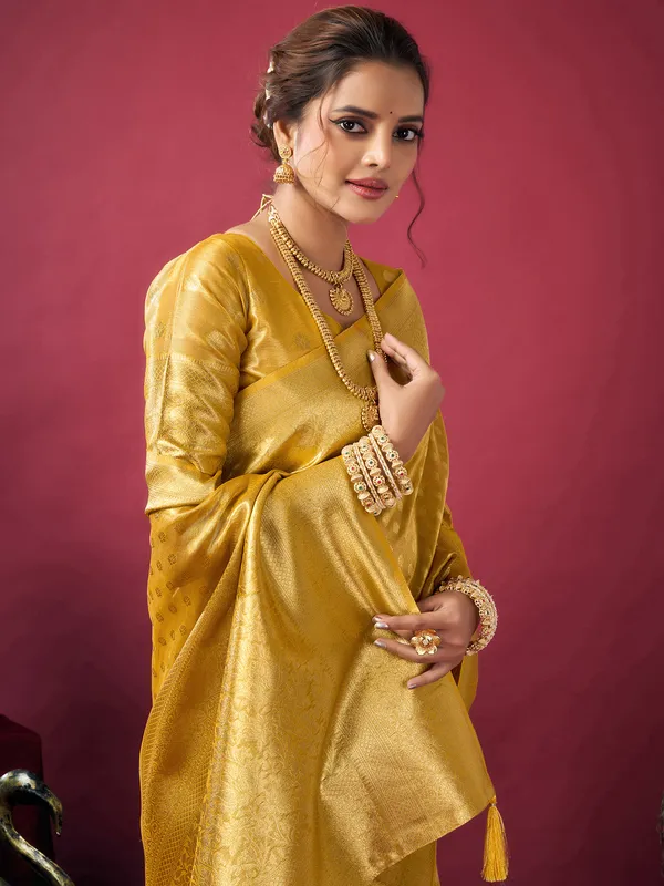 Yellow silk festive wear saree with zari work