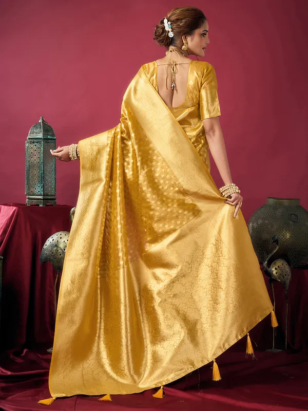 Yellow silk festive wear saree with zari work