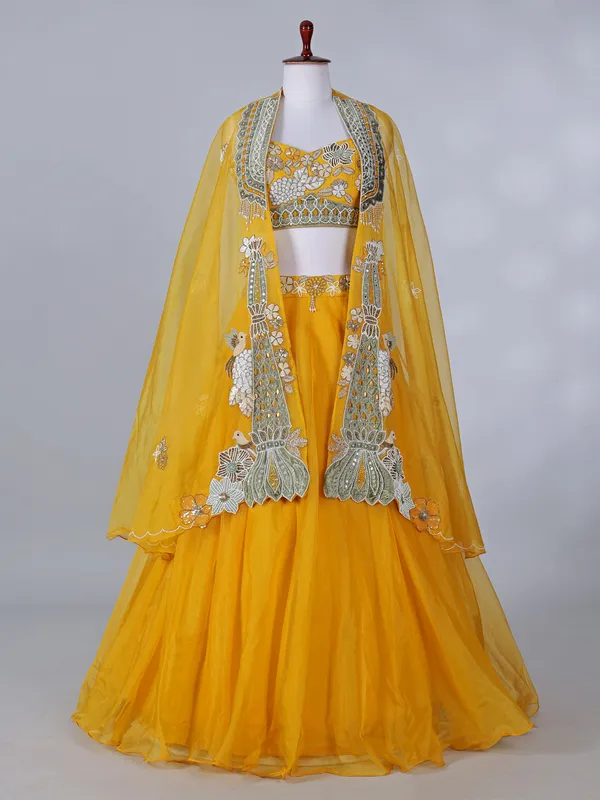 Yellow silk haldi wear lehenga choli with shrug