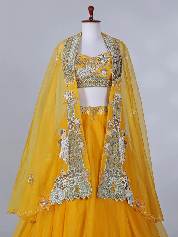 Yellow silk haldi wear lehenga choli with shrug