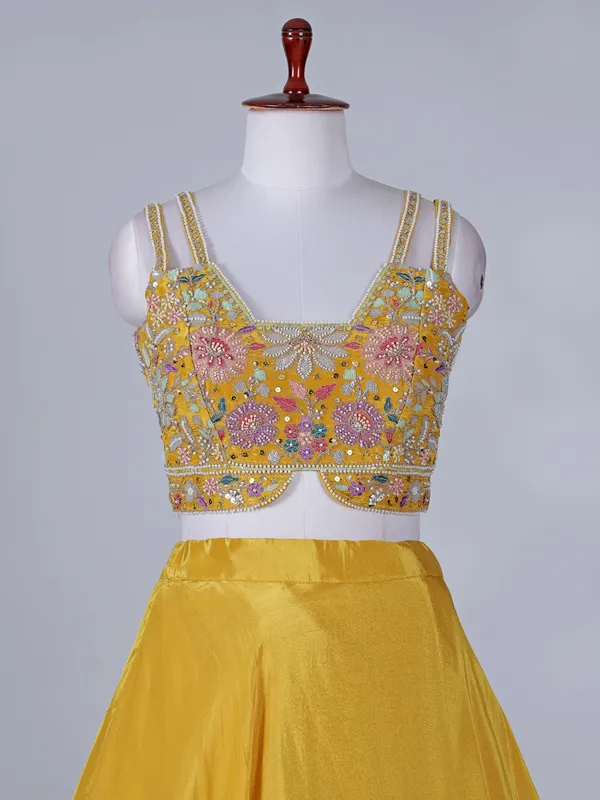 Yellow silk jacket style lehenga choli for haldi